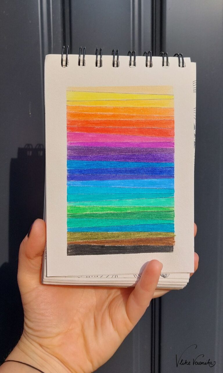 Zeichne bunte Streifen in deinen Kunstblock.