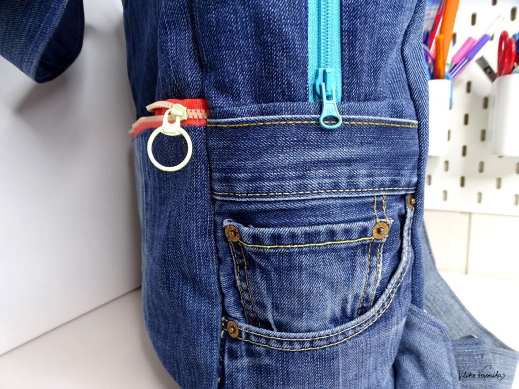 Nähe ein Fach für die Trinkflasche an den Rucksack aus alten Jeans.